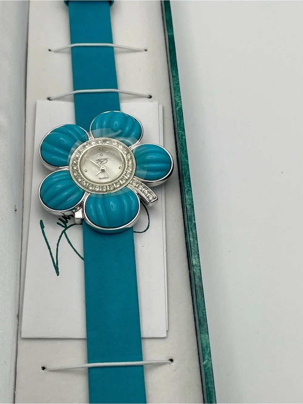 Suzanne Somers Turquoise Flower Watch with Rhinestone Bezel. Blue Leather Band